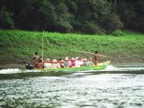 Sailing by a motorized Canoe, to visit the Enmbera Indians